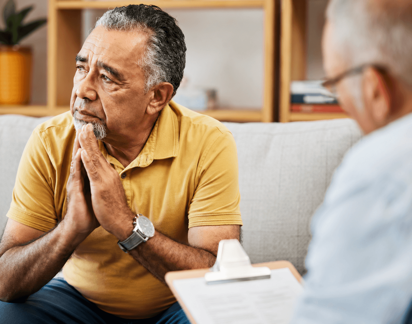 A patient in a quiet, contemplative moment with their clinician